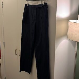 Vintage Giorgio Armani pleated blue pants.